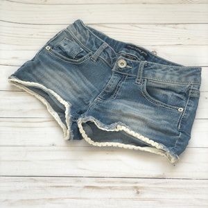 Girls Vanilla Star light wash jean shorts